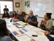 Community members discussing Casey Askar's campaign, highlighting controversies and civic engagement.